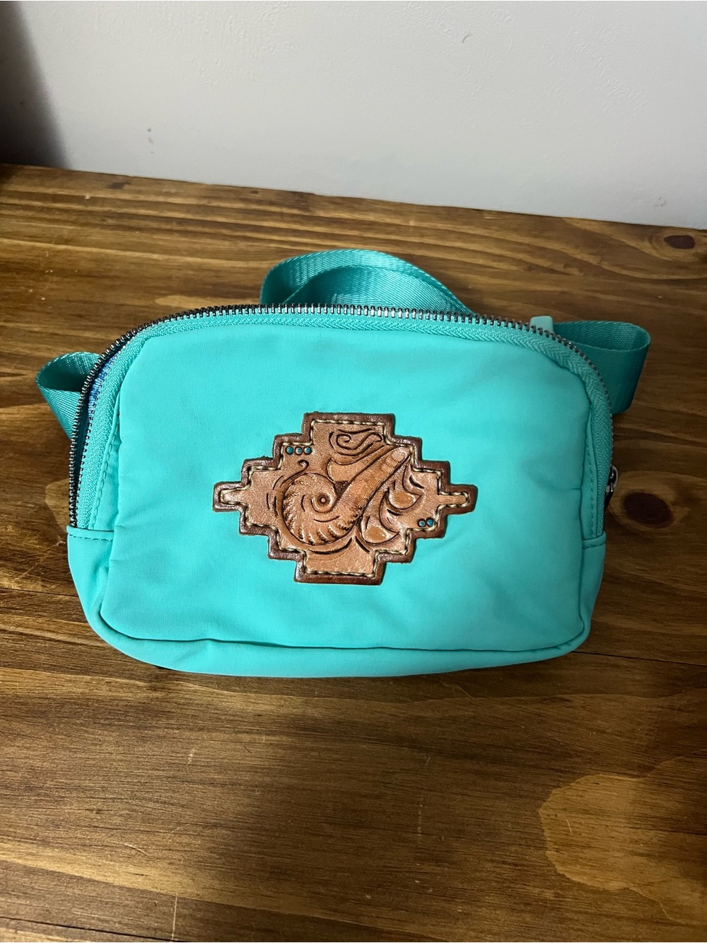 Turquoise Crossbody Belt Bag with Tooled Leather Patch
